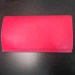Red Estée Lauder clutch / makeup bag